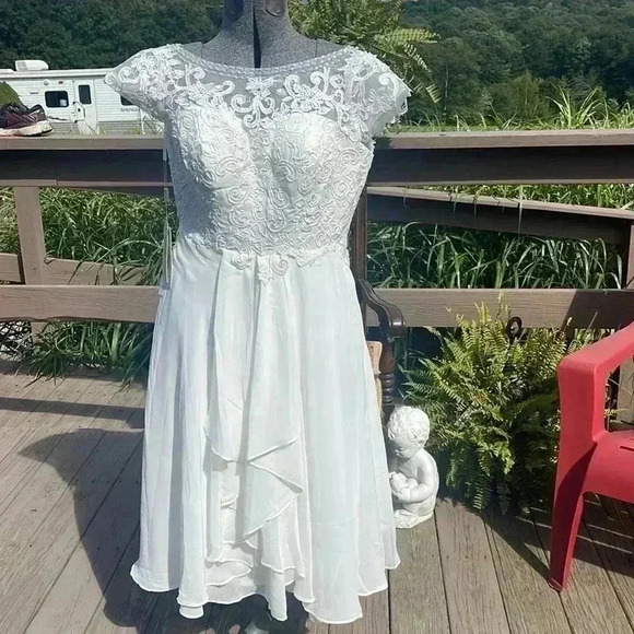 Wedding dress. Size 10. Seems to run small. - Picture 1 of 12